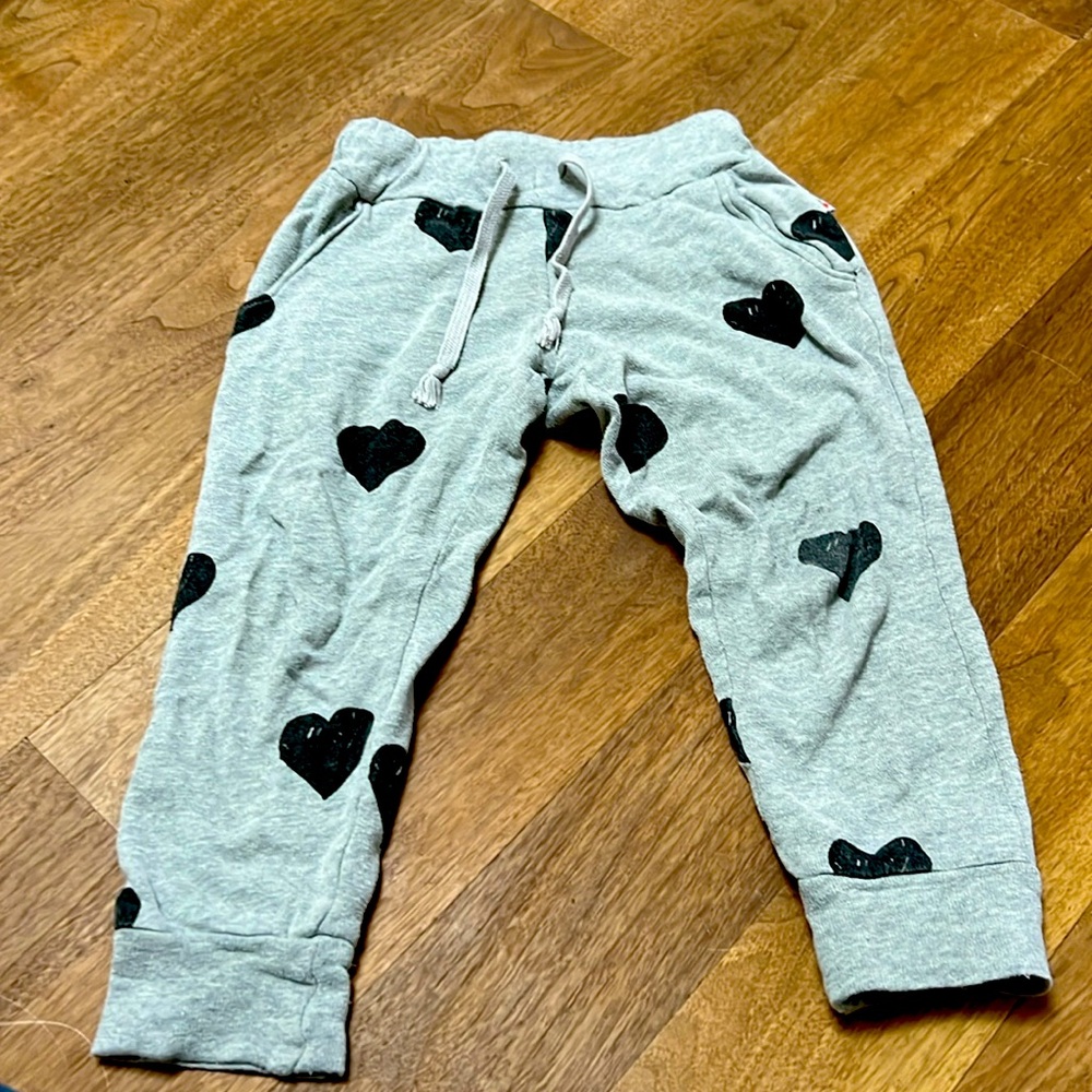 Adorable T2Love Sweatpants - Grey with black hearts.